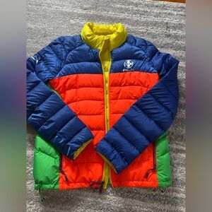 RLX women puffer size M new condition there is some damage from the zip